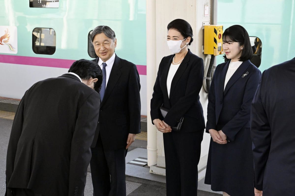 Emperor Naruhito, Empress Masako, and Princess Aiko arriving at Fukushima Station during recovery visit