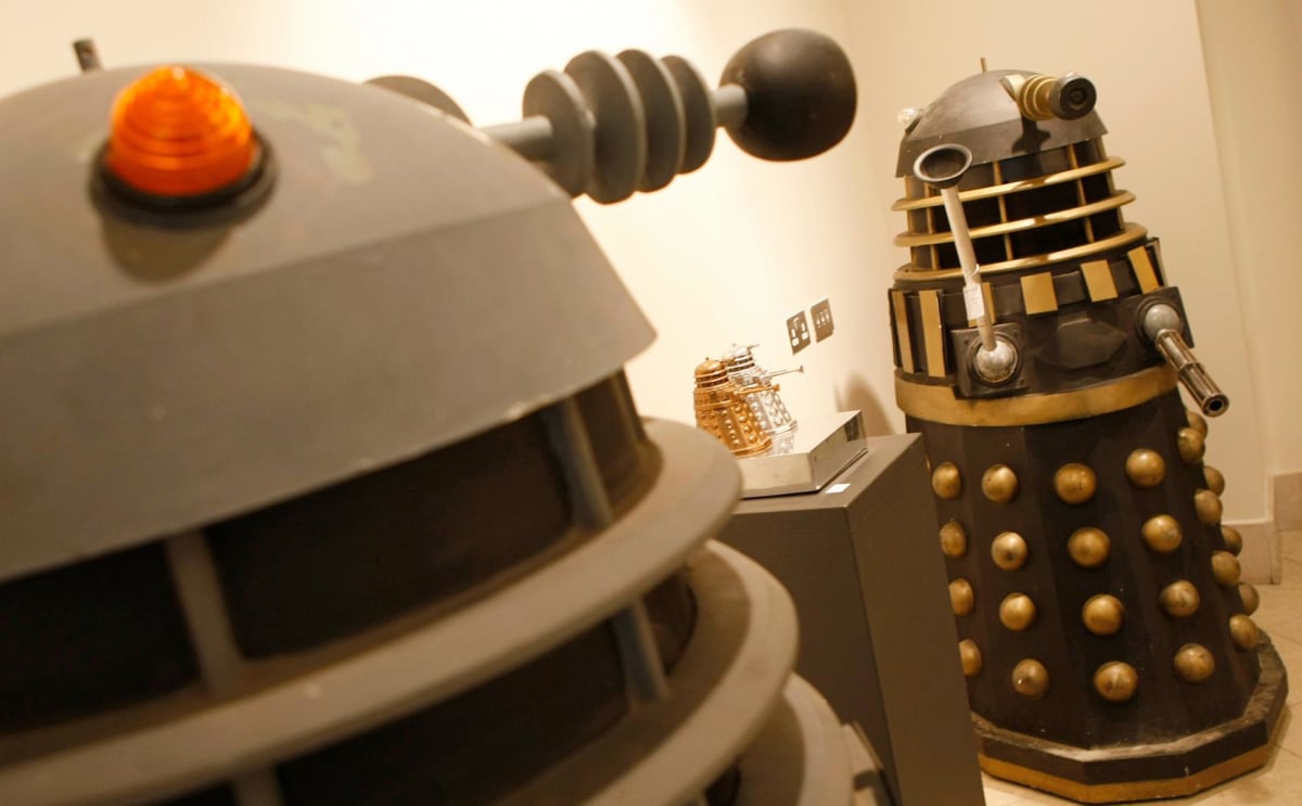 Black and white Dalek robots from 1960s Doctor Who television series on display