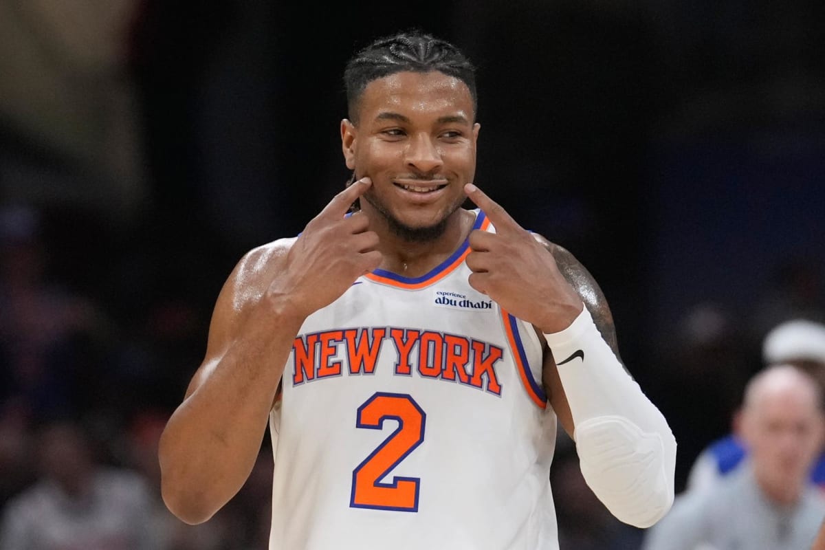 New York Knicks players celebrating on basketball court after clinching NBA Finals berth