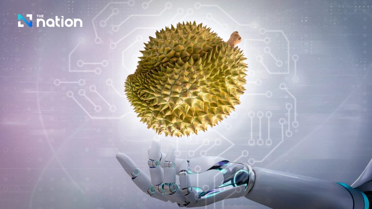 Workers sorting fresh durians using modern AI-powered quality control systems in Thai packing facility