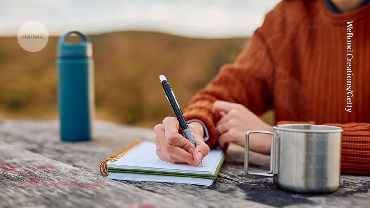 Person writing in notebook with scientific diagrams and nature imagery surrounding them