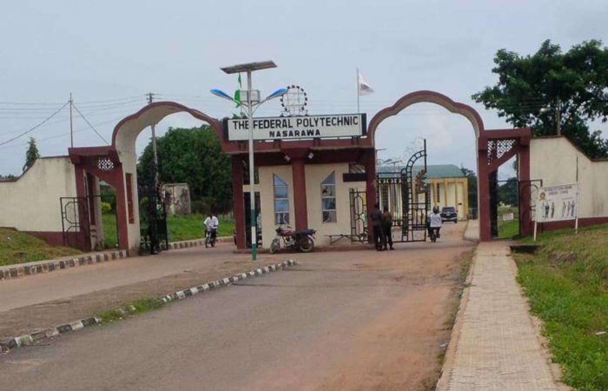 Modern university building in Nigeria with students studying mining and engineering technology