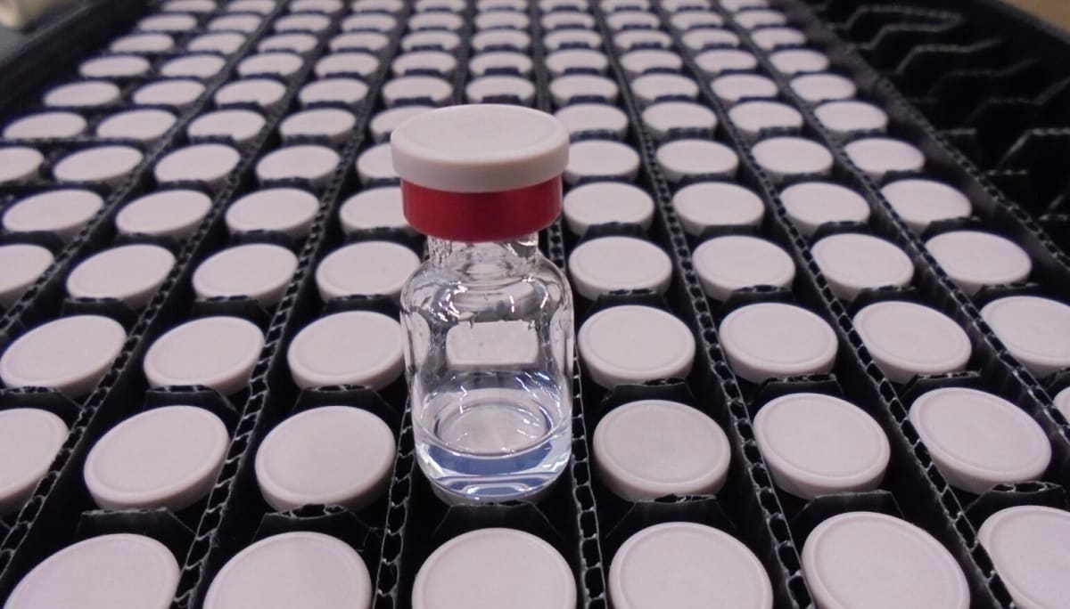 Nigerian healthcare workers preparing vaccine doses for children during emergency diphtheria outbreak response