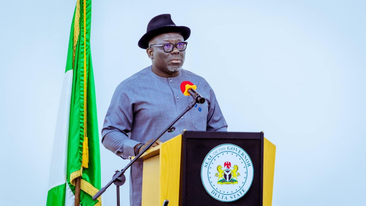 Healthcare workers in scrubs standing together in modern Nigerian hospital facility