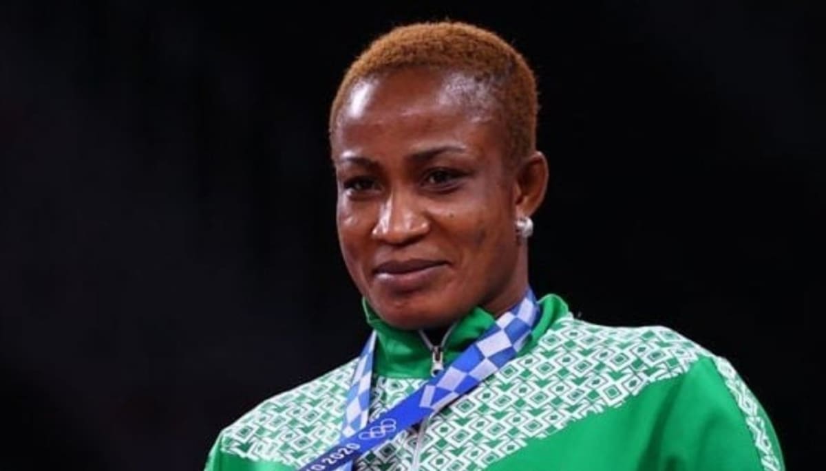 Nigerian Olympic wrestler Blessing Oborududu holding silver medal at Tokyo 2020 Games