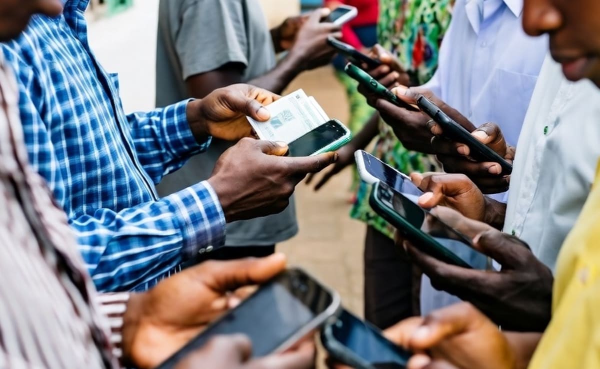 Nigerian mobile phone users celebrating improved network service and customer compensation from telecom providers
