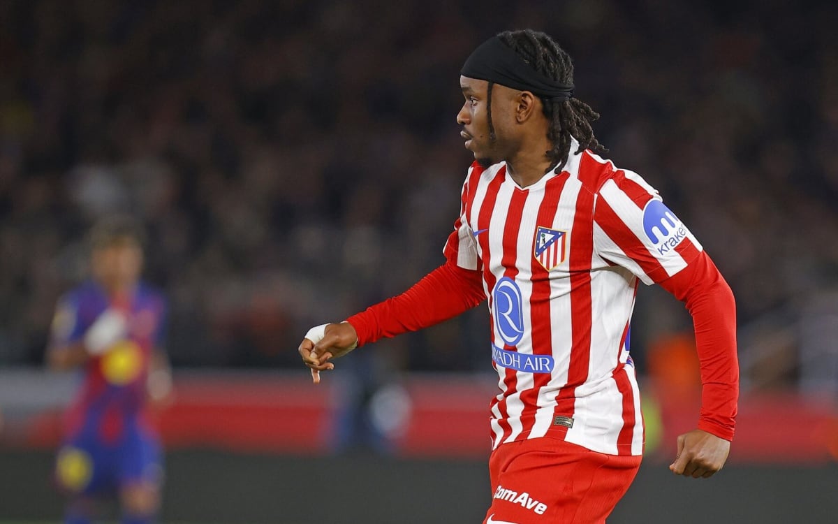 Ademola Lookman in Atlético Madrid jersey celebrating historic Champions League victory at Barcelona