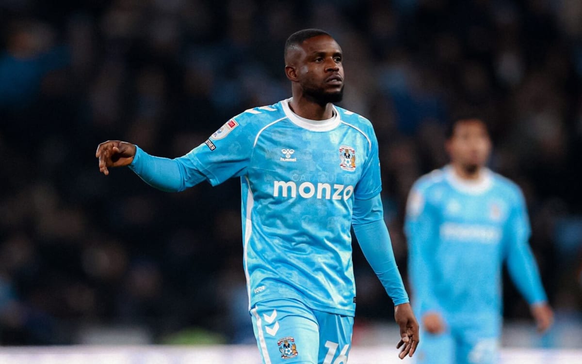 Frank Onyeka in Coventry City jersey speaking to teammates after match