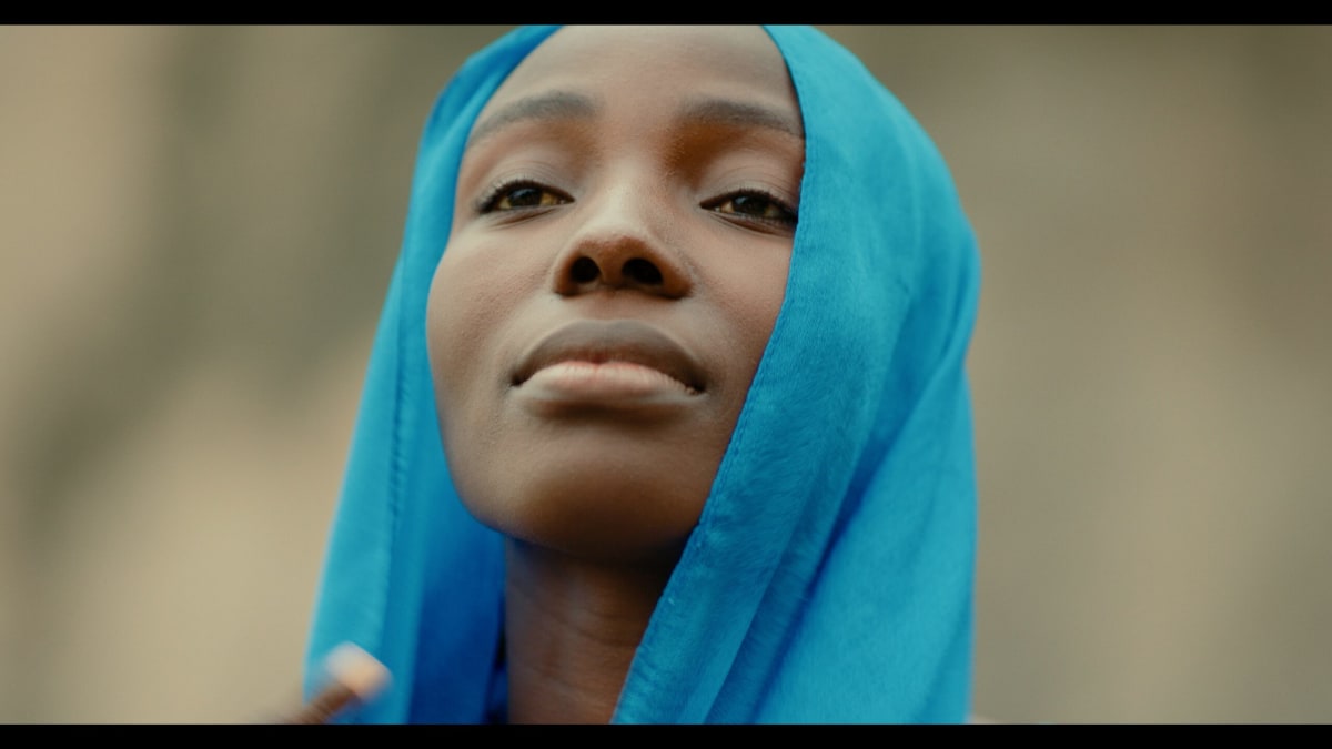 Nigerian mothers standing together at the Mothers of Chibok documentary premiere in Lagos