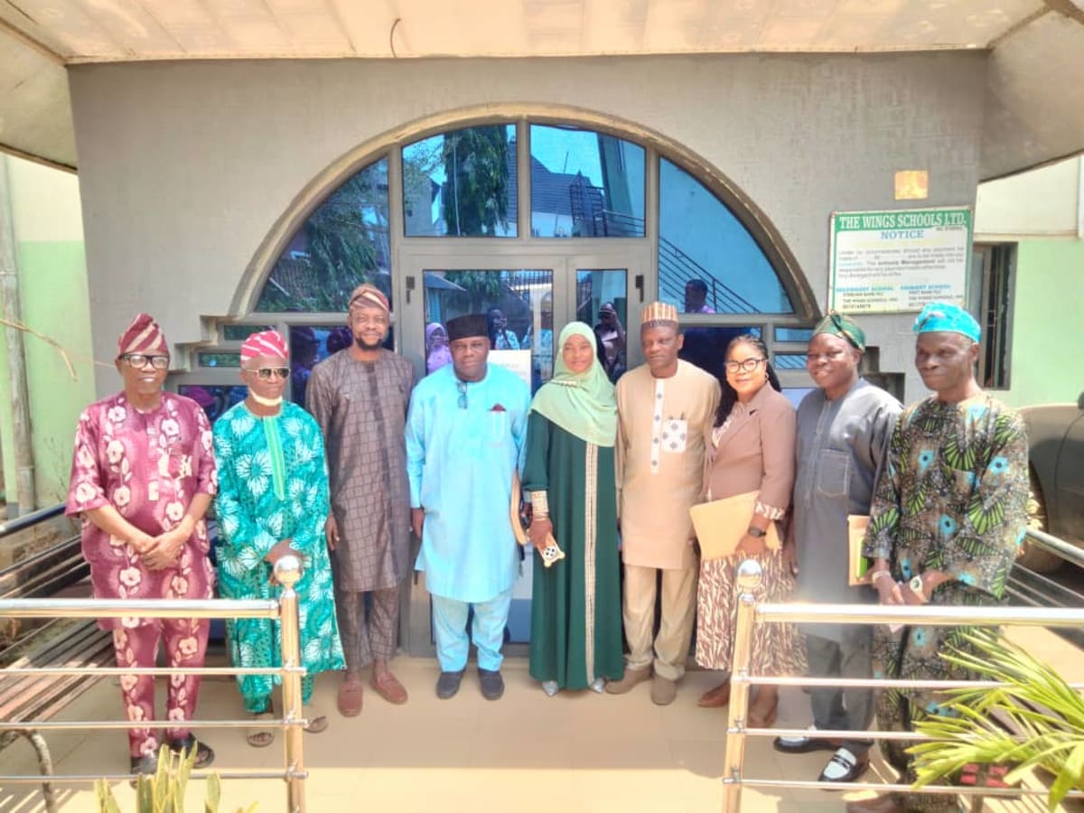 Nigerian educators and students gathered at ceremony celebrating founding college leader's achievements