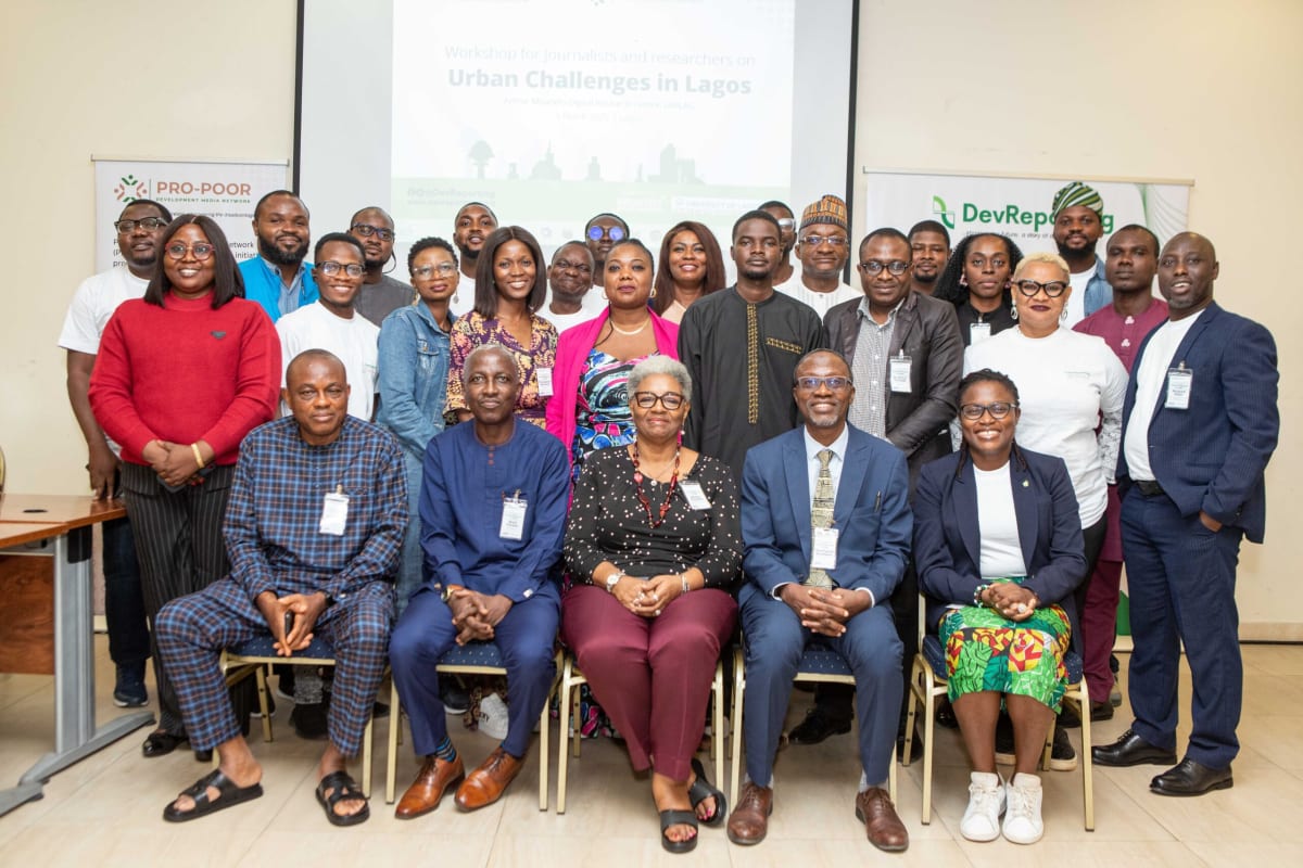 Journalists and researchers collaborate at workshop table in Lagos university setting