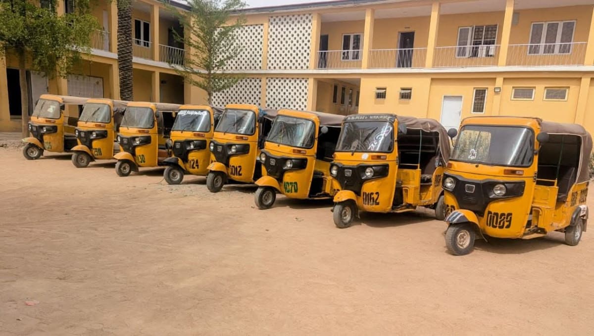 Three recovered tricycles parked at police headquarters in Kano, Nigeria awaiting return to owners