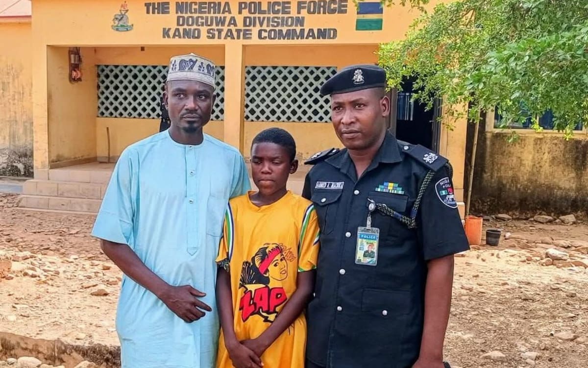 Police officers standing with reunited family members showing relief and gratitude after finding missing teenager