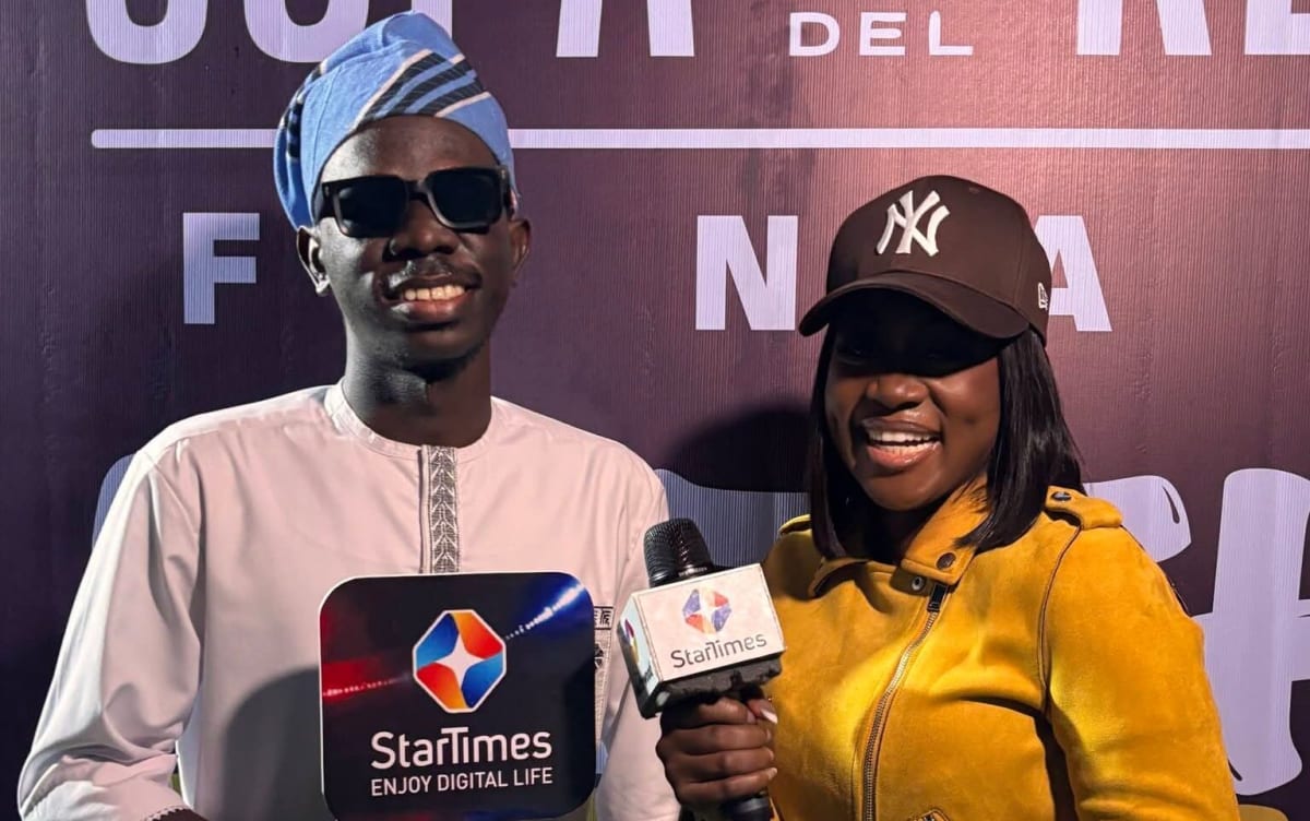 Nigerian football fans celebrating together at packed Lagos watch party venue