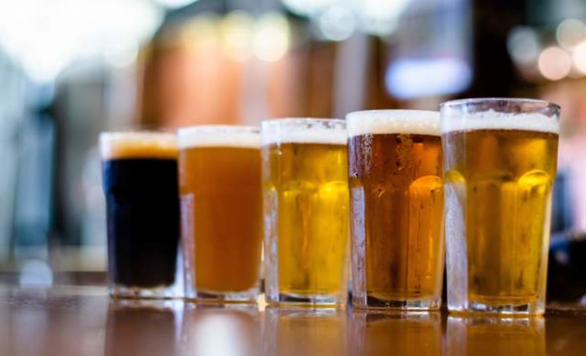 International Breweries beer bottles on production line in Nigerian manufacturing facility