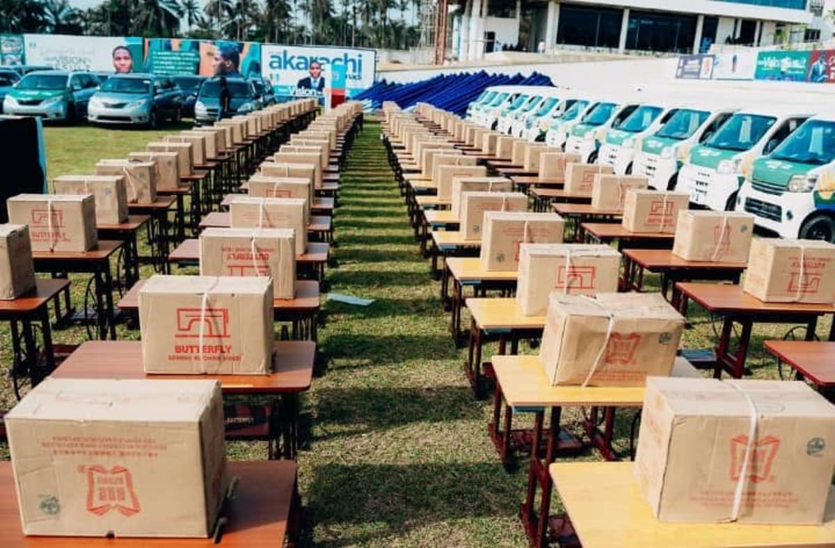 Nigerian Representative Akarachi Amadi distributing vehicles and equipment to constituents at empowerment event in Imo State