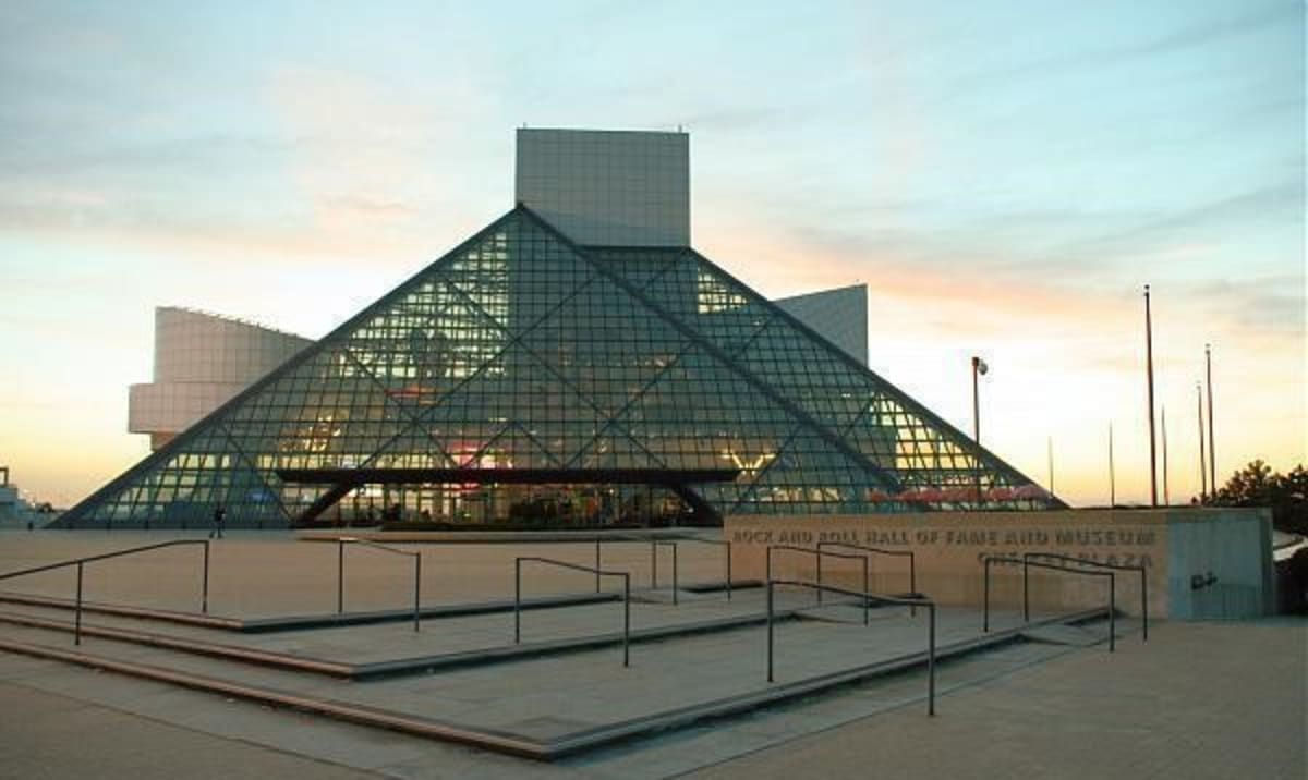 Split image showing Fela Kuti performing with saxophone and Sade Adu singing on stage
