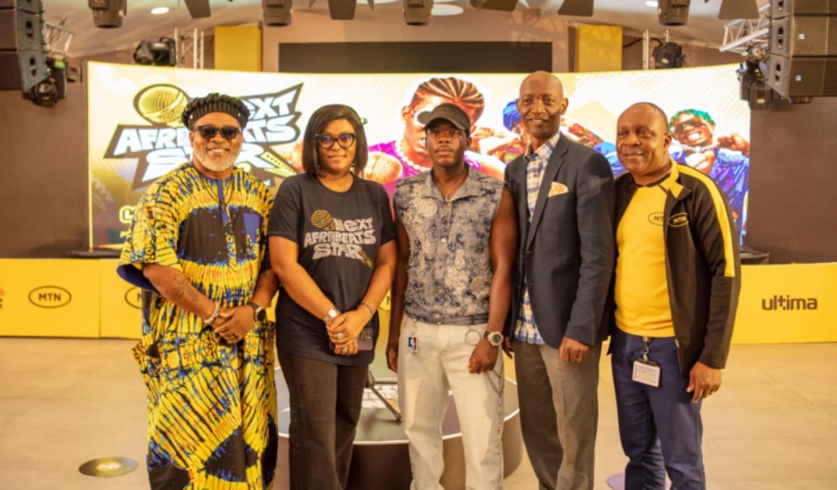 Young Nigerian musician performing on stage during MTN Next Afrobeats Star competition auditions