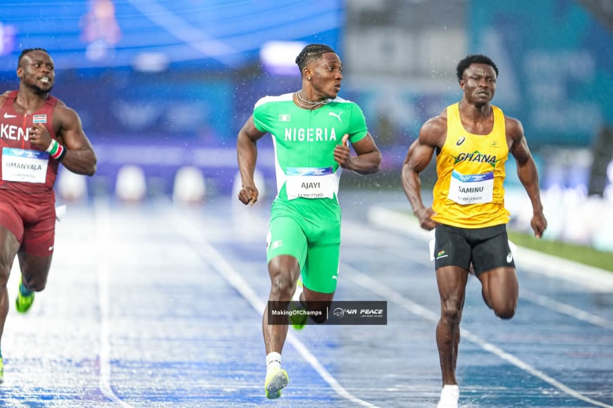 Nigerian sprinter Kanyinsola Ajayi crossing finish line at Commonwealth Games track event in Glasgow