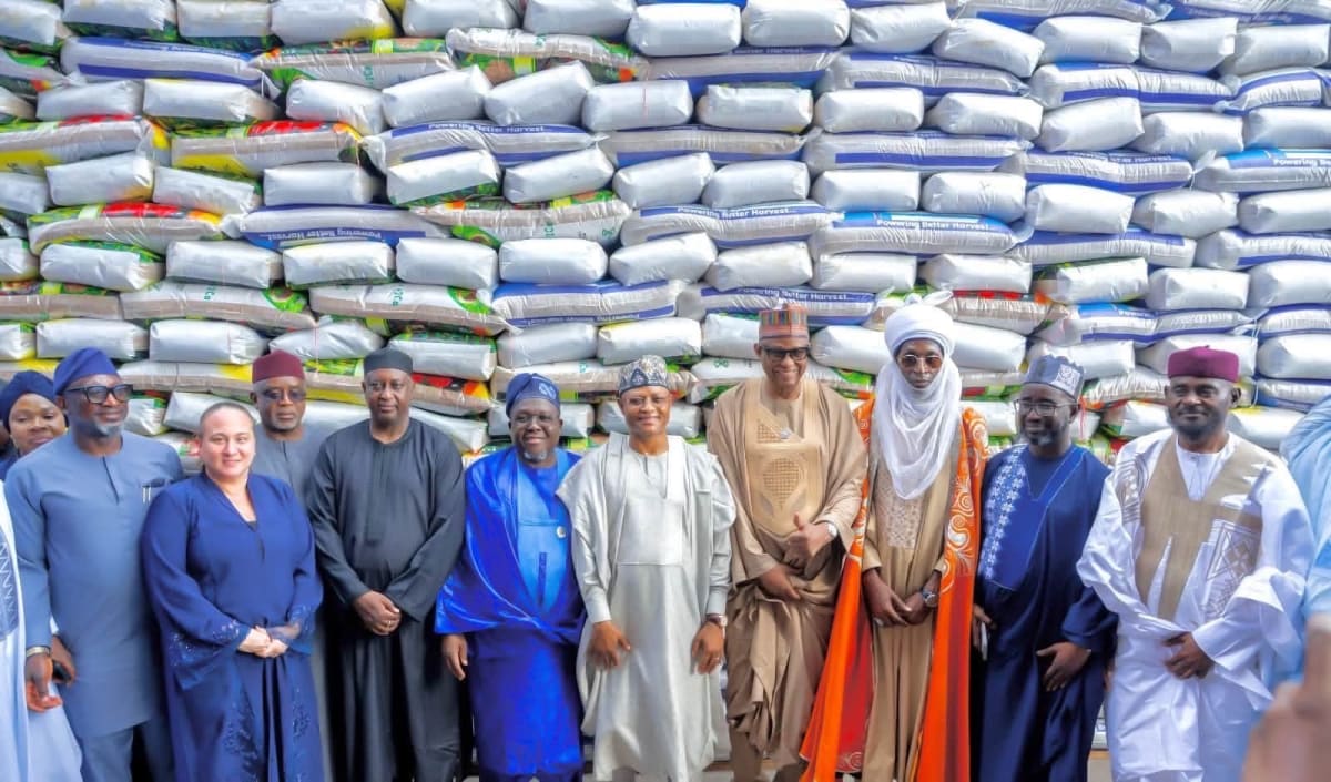 Farmers receiving bags of fertilizer at distribution event in Kaduna State, Nigeria