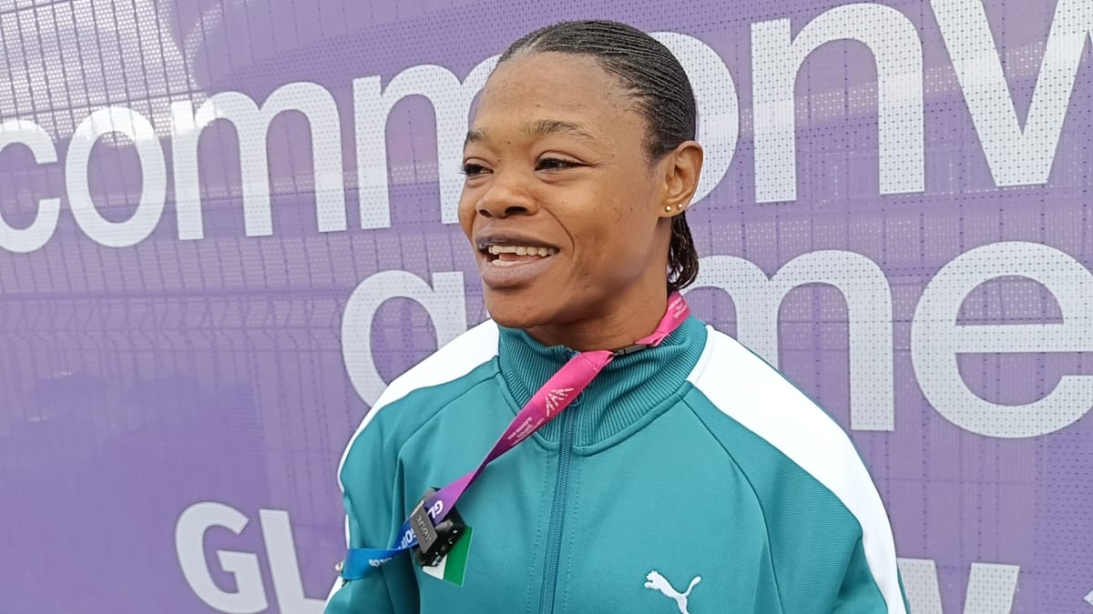 Nigerian weightlifter Rafiat Lawal celebrates after winning gold medal at Commonwealth Games in Glasgow