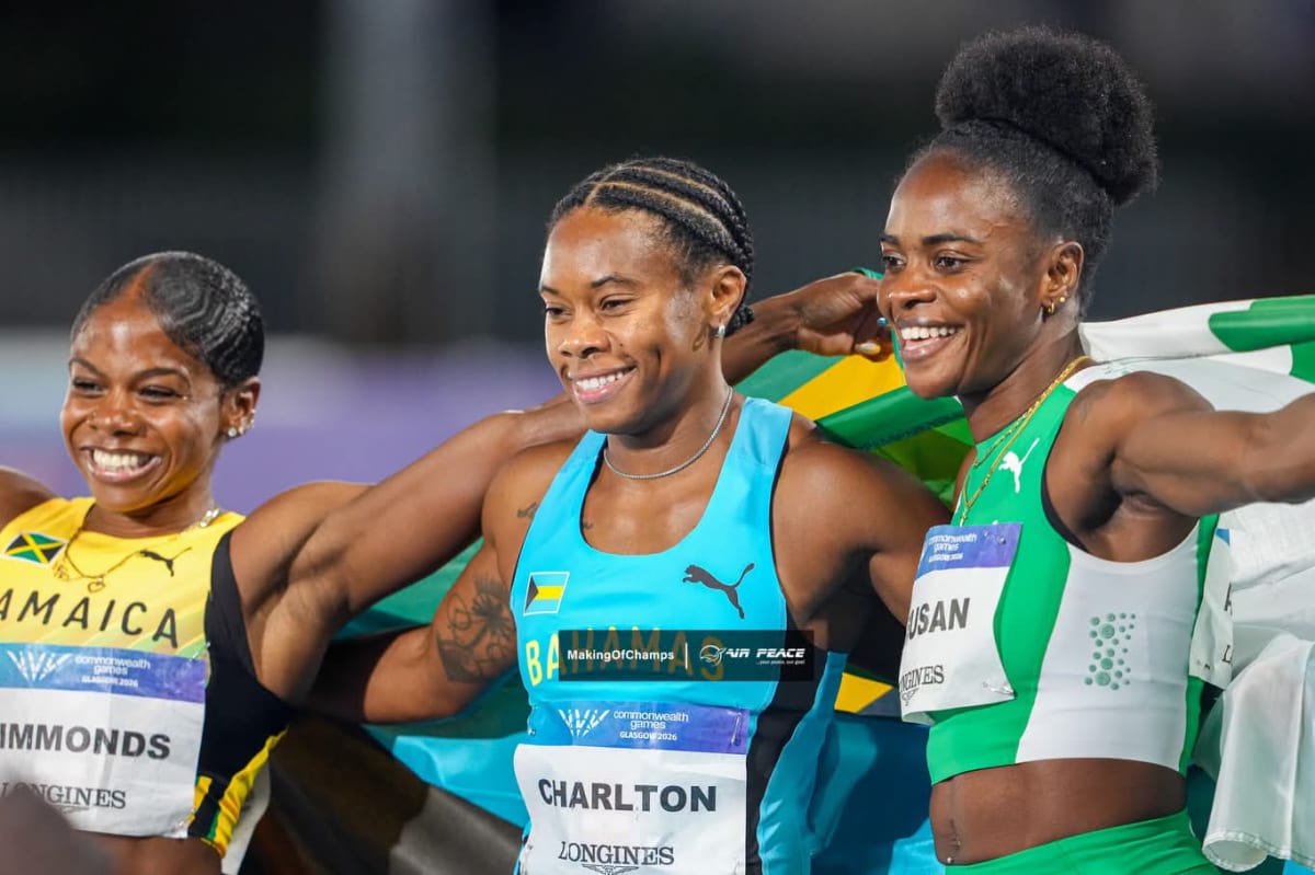 Nigerian hurdler Tobi Amusan competing at Commonwealth Games in Glasgow wearing her country's colors
