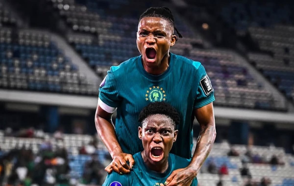 Nigerian soccer player Asisat Oshoala celebrating after scoring the winning goal against Zambia
