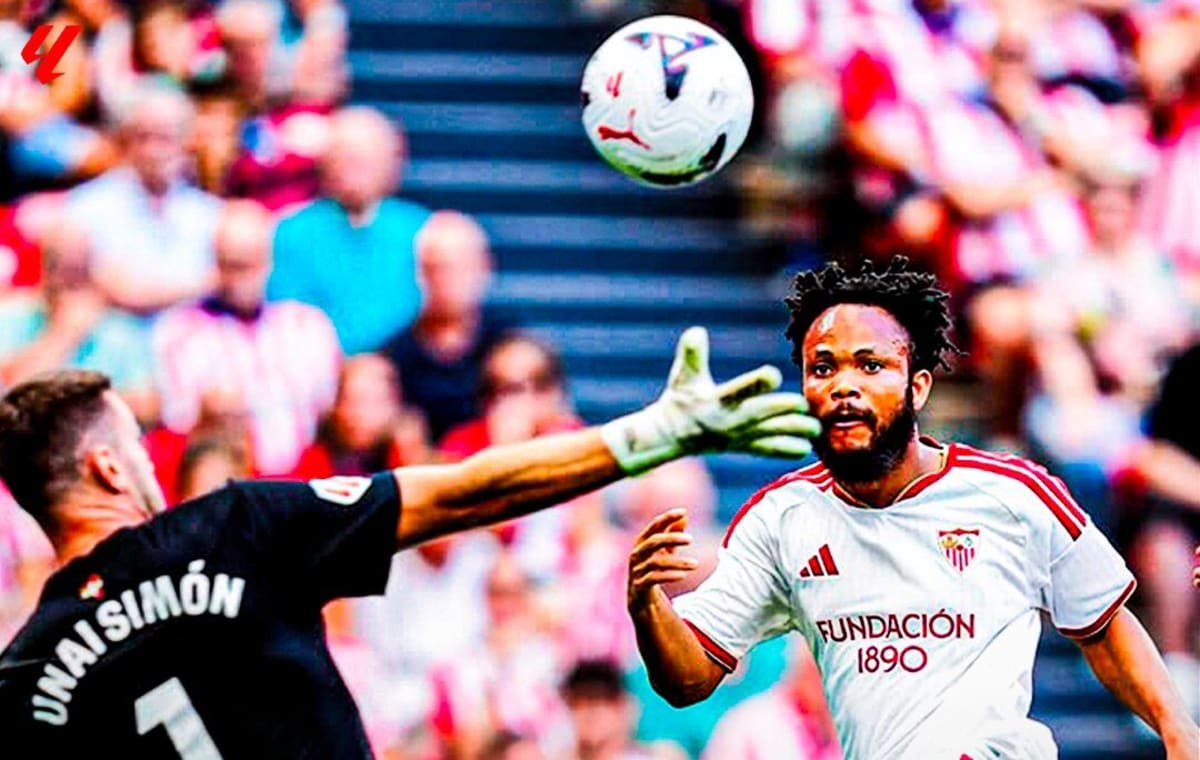 Nigerian soccer player Chidera Ejuke celebrating goal in Sevilla jersey during LaLiga match