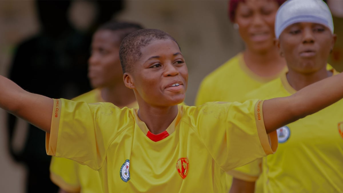 Edo Queens women's football team celebrating victory on field in Ouagadougou, Burkina Faso