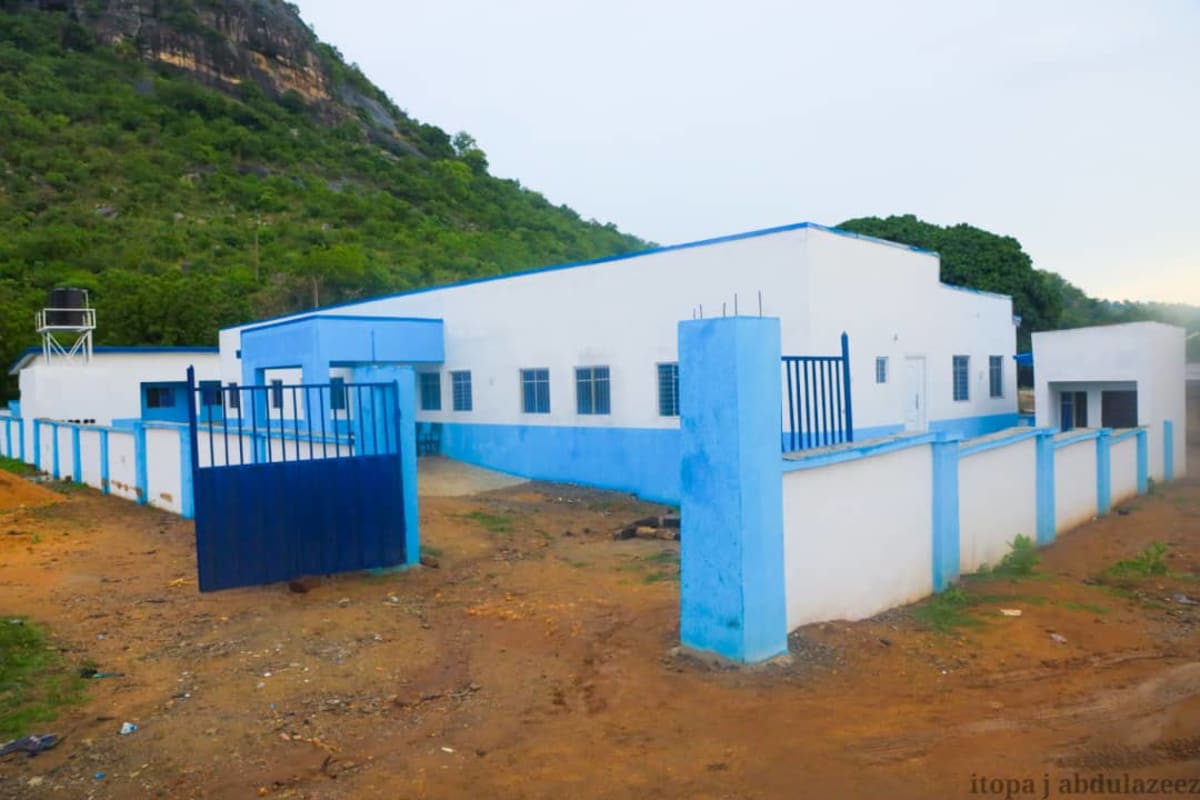 Renovated primary healthcare center in Kogi State Nigeria with patients receiving medical care