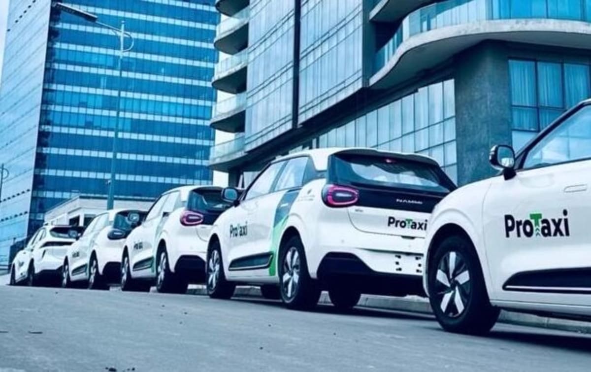 Green energy taxi vehicle representing Nigeria's new ProTaxi ride-hailing service launching October first