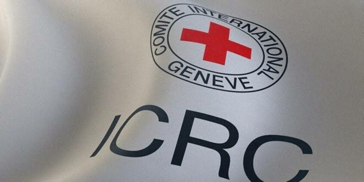 Red Cross workers helping displaced families search for missing loved ones in Nigeria
