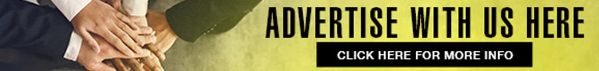 Golfers on green course preparing to tee off at charity tournament for ambulance fundraiser