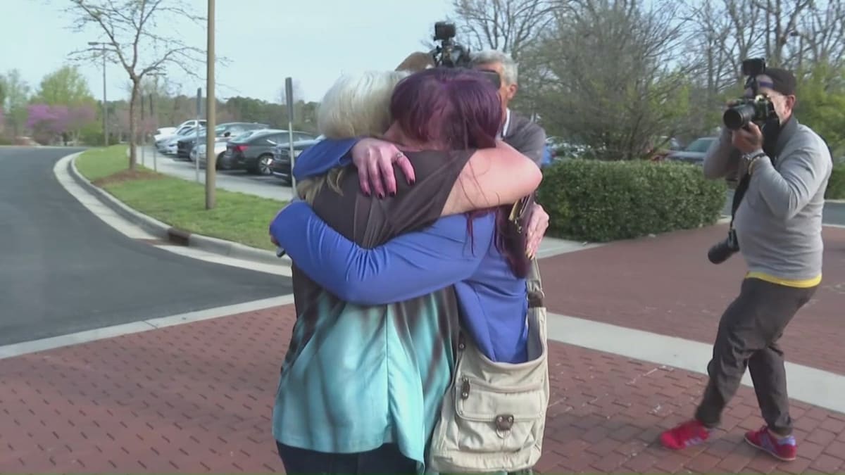 Mother and daughter embrace in emotional reunion outside North Carolina courthouse after 24 years apart