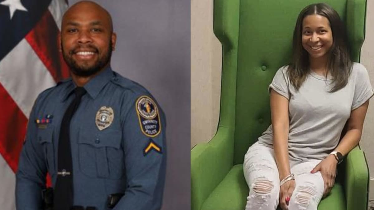 Police officer holding toddler while performing CPR as bystanders watch anxiously nearby