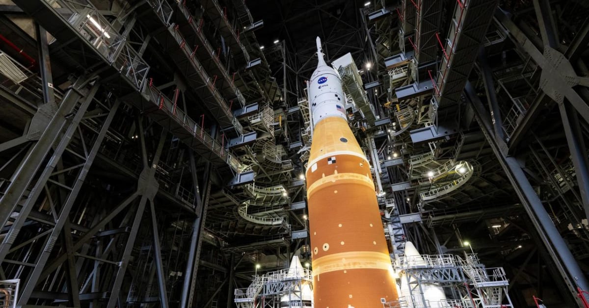 NASA's towering Space Launch System rocket standing on launch pad at Kennedy Space Center