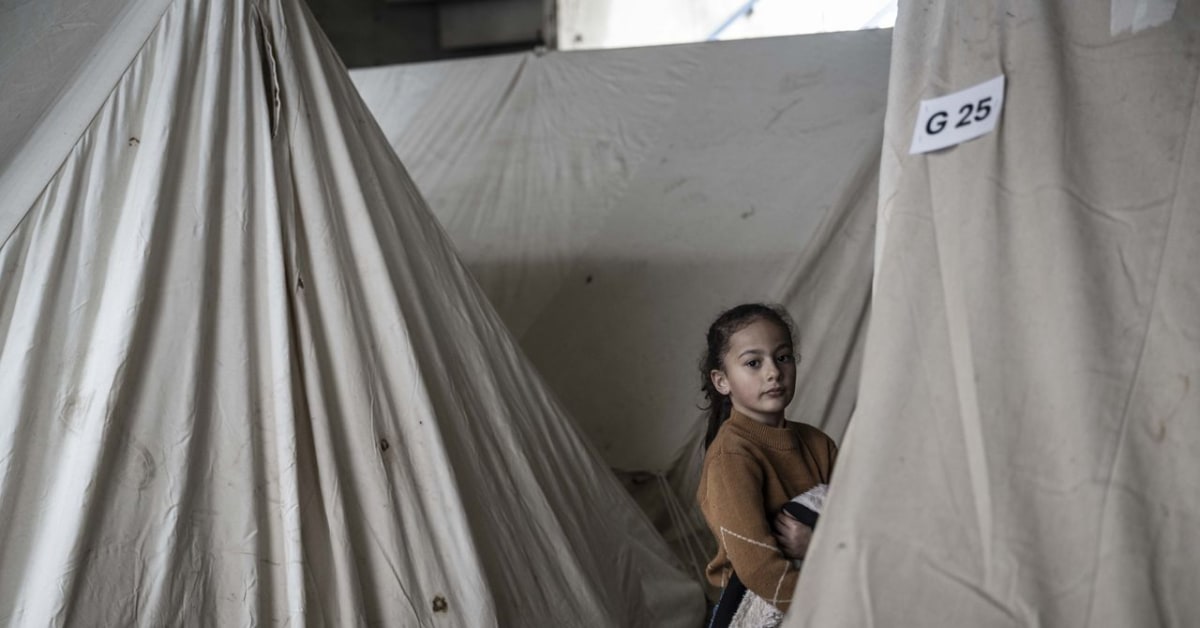 Person using smartphone to send digital payment for humanitarian aid in Lebanon