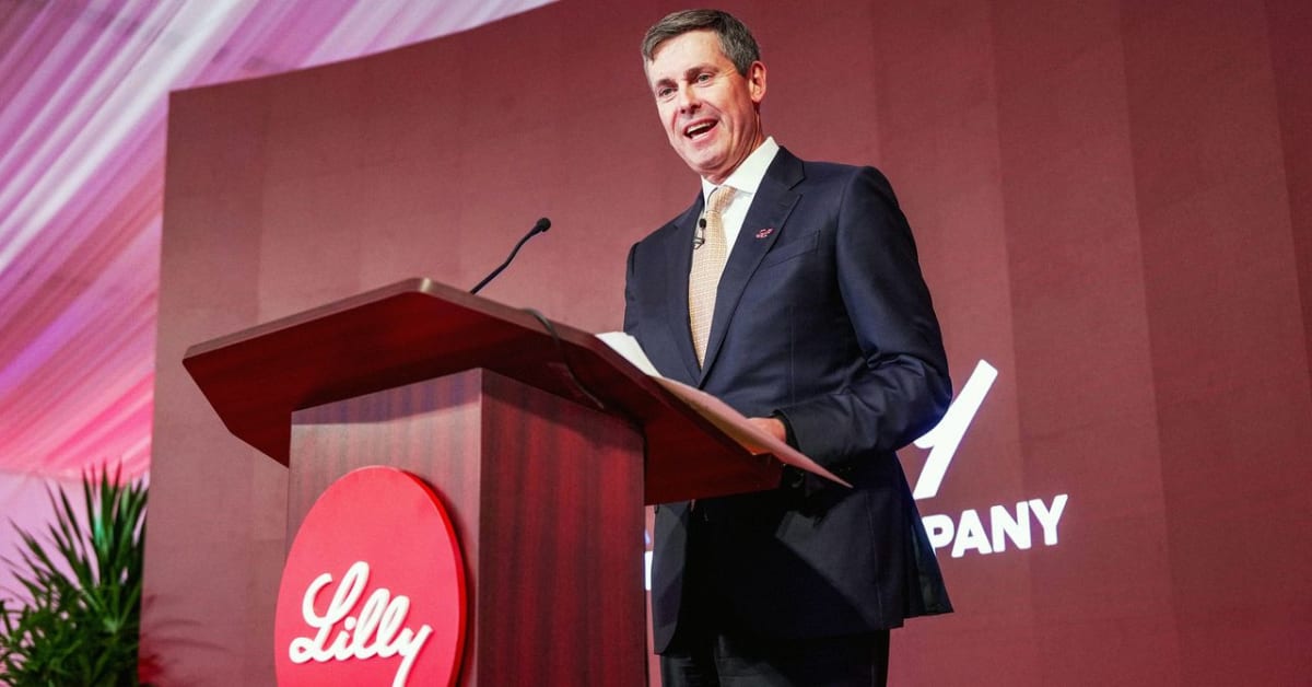 White pill bottle with daily medication tablets for weight loss treatment on clean background