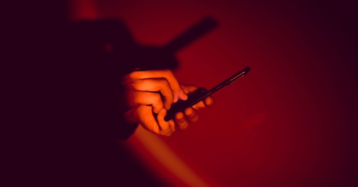 Android phone screen showing incoming call warning message about potentially spoofed caller identity