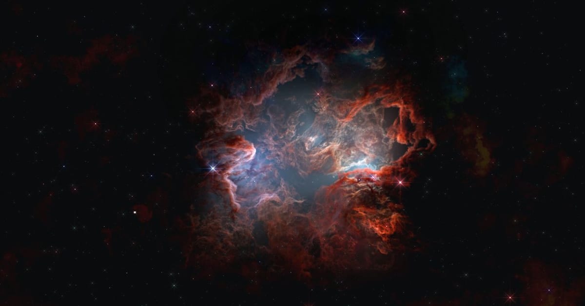 Colorful particle collision visualization showing streams of particles exploding from a central point in a detector
