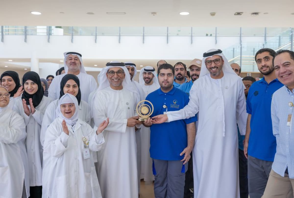 Students with disabilities working in modern innovation workshop creating prosthetics and technology products in Abu Dhabi