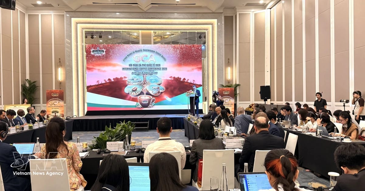 ** Vietnamese coffee stand at international event showcasing sustainable coffee products to global audience