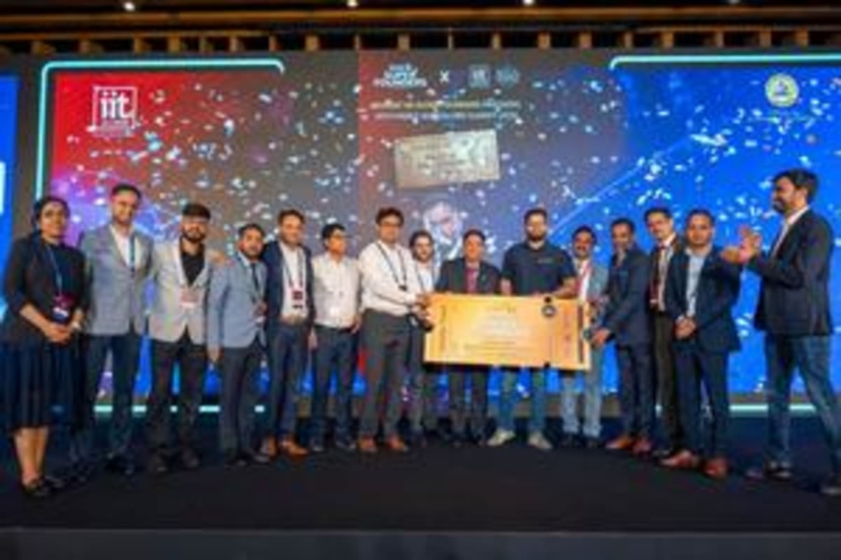 PrecizionIQ team members holding Golden Ticket award at PanIIT Bangalore Summit 2026