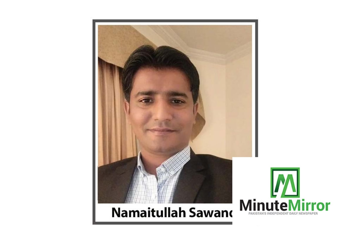 Rural Pakistani women gathered in community meeting discussing microfinance and poverty reduction programs