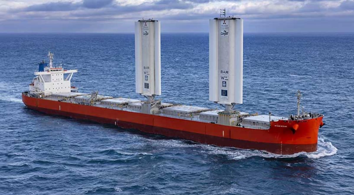 Scientists from different nations working together on marine research vessel in open ocean waters