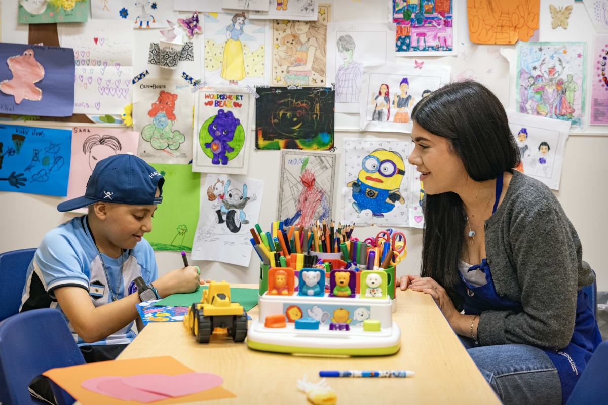 Cancer Survivor, 25, Returns to Help Kids at Same Hospital