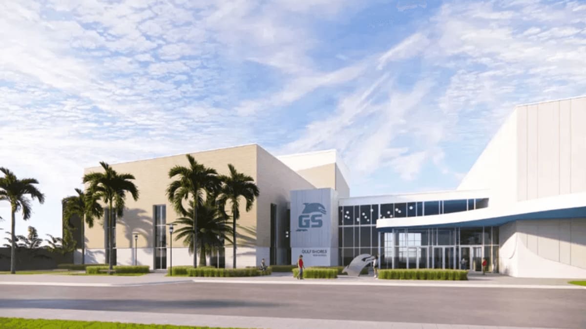 Exterior view of new Gulf Shores High School building with modern architecture and outdoor learning spaces