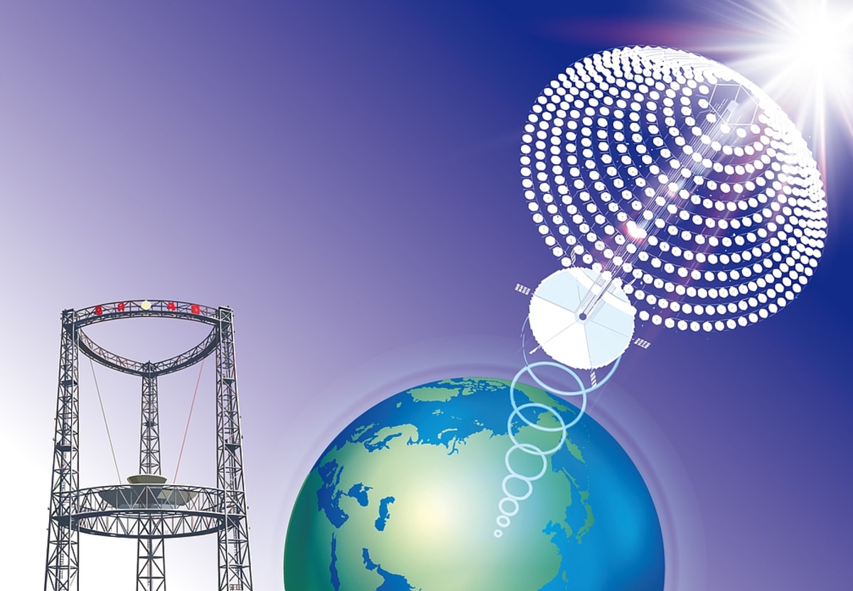 Illustration of orbiting space solar power station beaming energy via microwave transmission technology
