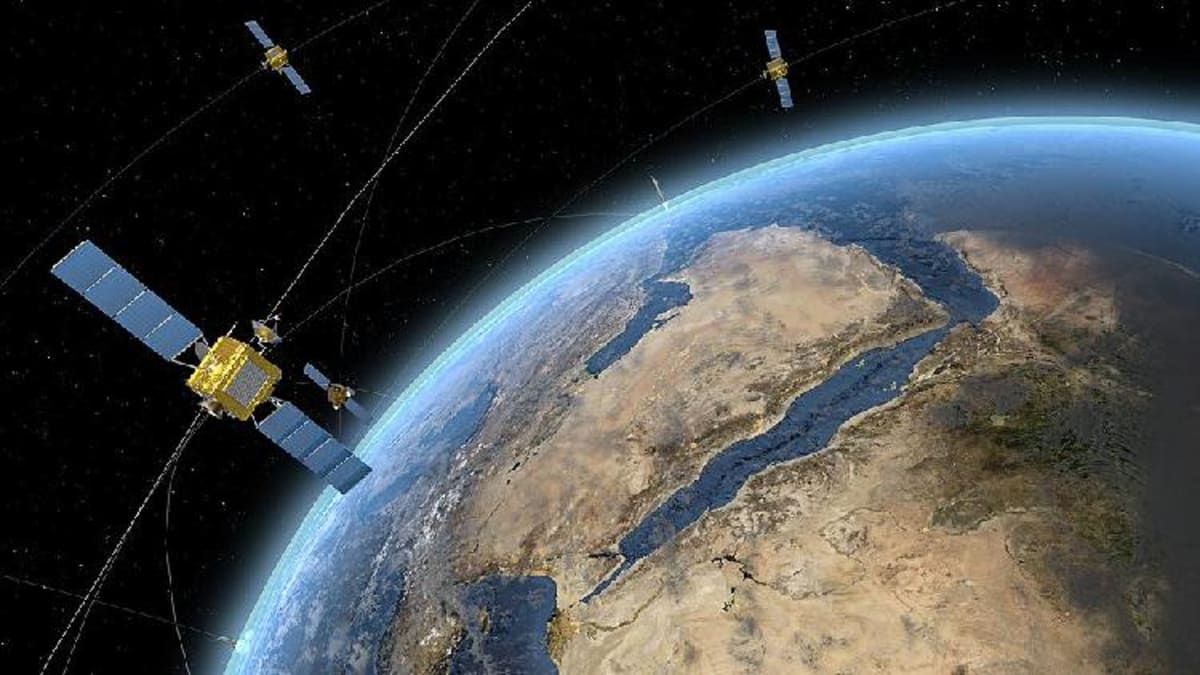 Satellite launching into space on rocket with Earth visible in background showing international cooperation