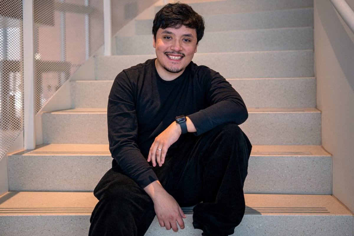 MIT student Mariano Salcedo working with colorful visual simulation responding to audio in real time